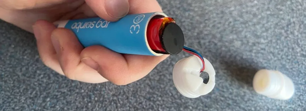 Aquios Bar battery removal close-up
