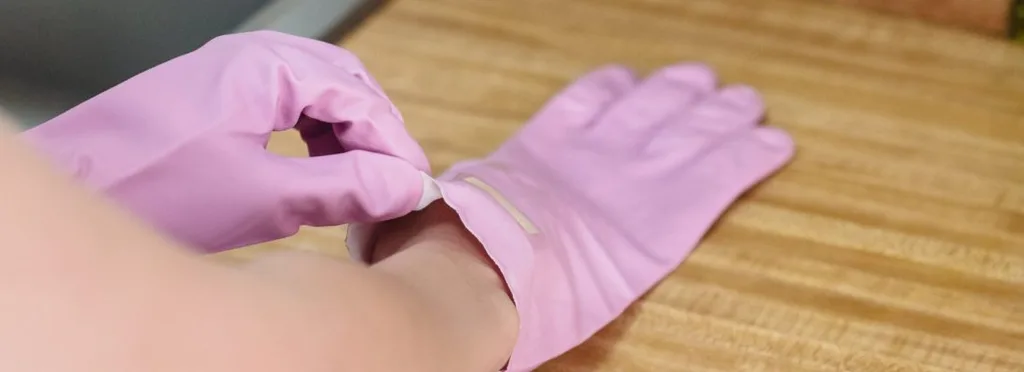 Rubber gloves for better grip on a stuck bottle cap